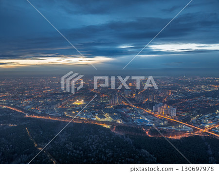 Urban landscape with numerous buildings, trees and residential areas 130697978