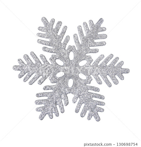 A Christmas decorative tree ornament in the shape of a silver shiny snowflake, isolated on a white background with clipping path. Design element for Christmas card A Christmas decorative tree ornament in the shape of a silver shiny snowflake, isolated on a white background with clipping path. Design element for Christmas card 130698754