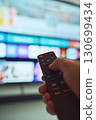 Watching shows on a modern television 130699434