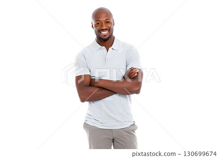 Portrait of a smiling man wearing a white polo shirt. Casual and positive lifestyle image 130699674