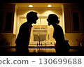 married couple is quarreling in home. Silhouette of an aggressive husband and wife screaming in the kitchen. Couple is fighting. Domestic violence and abusive relationships 130699688