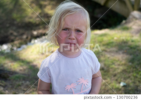 little girl crying from hurt feelings little girl crying from hurt feelings 130700236