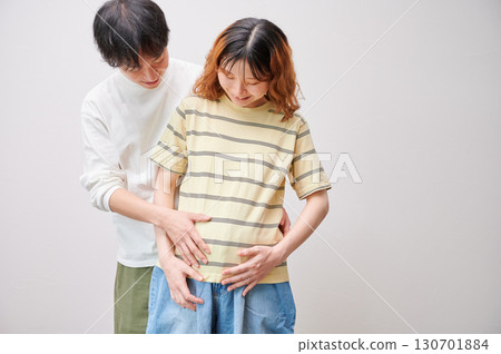 Couple facing each other, pregnant woman, maternity Couple facing each other, pregnant woman, maternity 130701884