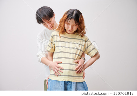 Couple facing each other, pregnant woman, maternity Couple facing each other, pregnant woman, maternity 130701912