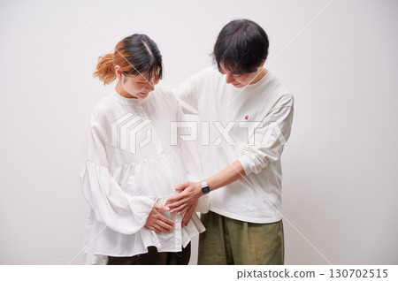 Couple facing each other, pregnant woman, maternity Couple facing each other, pregnant woman, maternity 130702515