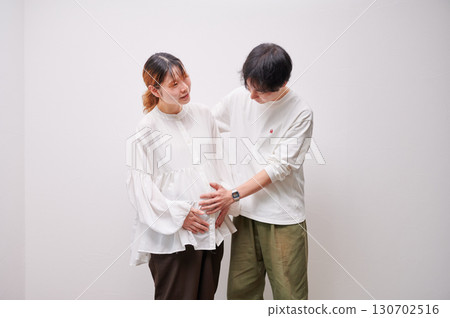 Couple facing each other, pregnant woman, maternity Couple facing each other, pregnant woman, maternity 130702516