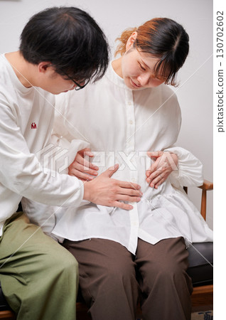 Couple facing each other, pregnant woman, maternity Couple facing each other, pregnant woman, maternity 130702602