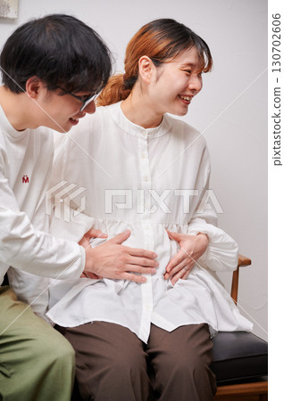 Couple facing each other, pregnant woman, maternity Couple facing each other, pregnant woman, maternity 130702606