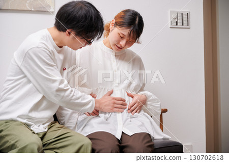 Couple facing each other, pregnant woman, maternity 130702618