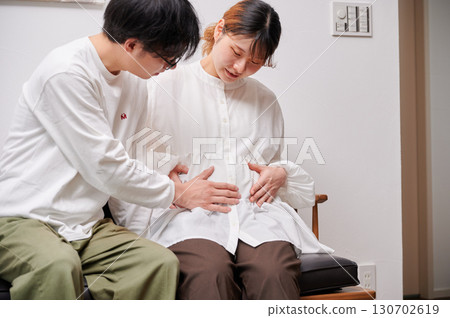 Couple facing each other, pregnant woman, maternity 130702619