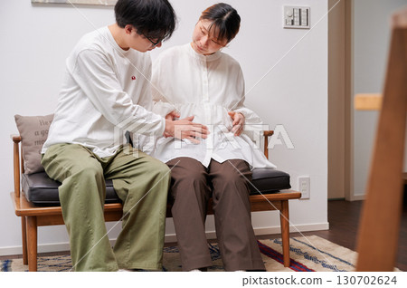 Couple facing each other, pregnant woman, maternity Couple facing each other, pregnant woman, maternity 130702624