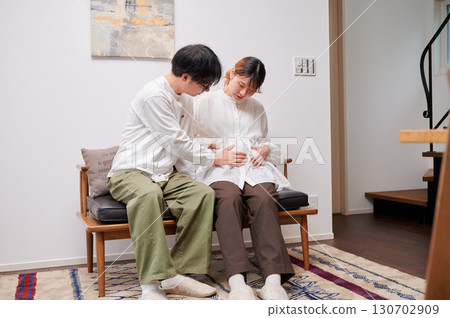 Couple facing each other, pregnant woman, maternity Couple facing each other, pregnant woman, maternity 130702909