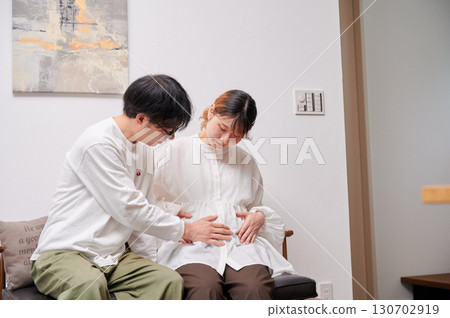 Couple facing each other, pregnant woman, maternity Couple facing each other, pregnant woman, maternity 130702919