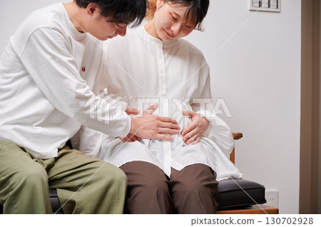 Couple facing each other, pregnant woman, maternity 130702928