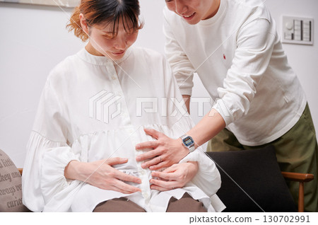 Couple facing each other, pregnant woman, maternity 130702991