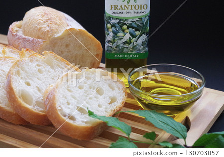 Extra virgin olive oil, bread, French bread Extra virgin olive oil, bread, French bread 130703057