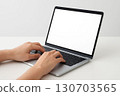 Operate a laptop computer 130703565