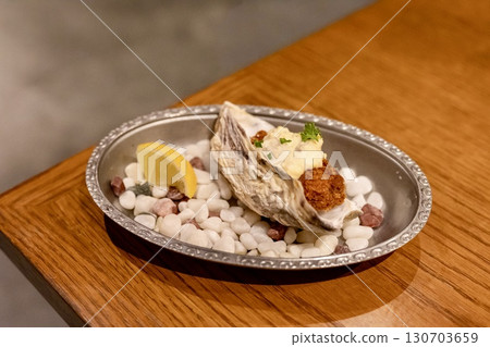 Fried oysters with lemon and tartar sauce 130703659