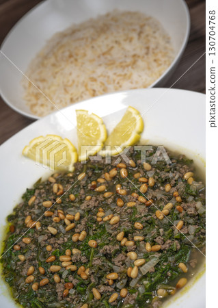 Spinach or Sabanekh with chicken a Mediterranean dish served with rice 130704768
