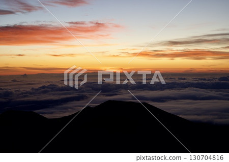 Sea of clouds and sunrise on the Big Island of Hawaii Sea of clouds and sunrise on the Big Island of Hawaii 130704816
