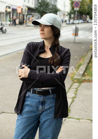 Portrait of a modern 30-year-old woman in the city. Portrait of a modern 30-year-old woman in the city. 130704869