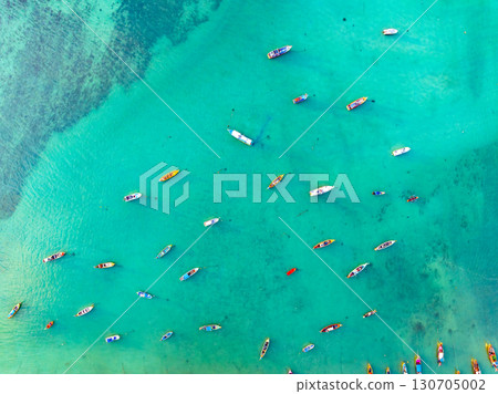 Aerial drone bird's eye view photo Top down of tropical sea with long tail fishing boats at phuket thailand 130705002