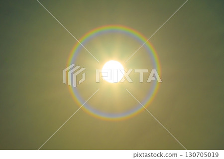 Shining sun on sunset sky with lens flare of sunlight on sky background Bright sun on golden sky Concept Nature and environment background 130705019