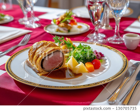 Exquisite Beef Wellington  Golden Puff Pastry with Truffle Duxelles & Prosciutto in Fine Dining Style	 130705735