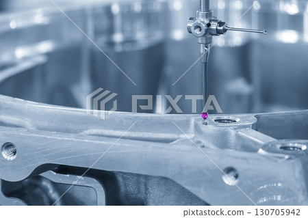 The CMM machine measuring the automotive parts by modular probe in the blue tone. The quality control of automotive parts with CMM machine. The CMM machine measuring the automotive parts by modular probe in the blue tone. The quality control of automotive parts with CMM machine. 130705942