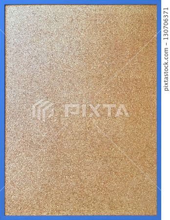 A vertical background image of a cork board with a thin light blue wooden frame 130706371