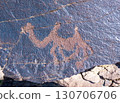 Ancient petroglyphs carved on rock in Kazakhstan, open-air archaeological monument 130706706