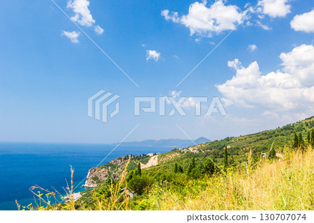 Panoramic view of beautiful landscape mountains and coastline azure sea. Aerial skyline of beaches and Adriatic coast, Montenegro Panoramic view of beautiful landscape mountains and coastline azure sea. Aerial skyline of beaches and Adriatic coast, Montenegro 130707074