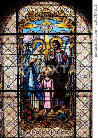 Holy Family, stained glass window in the Parish Church of the Visitation of the Virgin Mary in Zagreb, Croatia Holy Family, stained glass window in the Parish Church of the Visitation of the Virgin Mary in Zagreb, Croatia 130707611