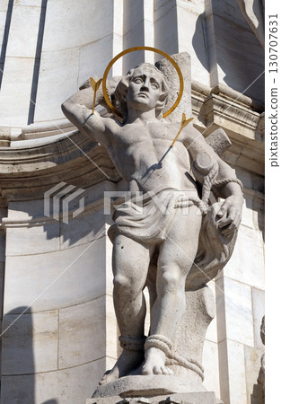 Statue of Saint Sebastian, detail of Holy Trinity plague column in front of Matthias Church in Budapest, Hungary Statue of Saint Sebastian, detail of Holy Trinity plague column in front of Matthias Church in Budapest, Hungary 130707631