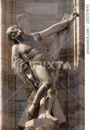Saint Andrew the Apostle, statue on the Milan Cathedral, Duomo di Santa Maria Nascente, Milan, Lombardy, Italy 130707643