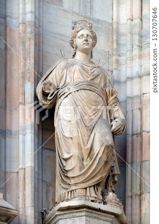 Statue of Saint on the facade of the Milan Cathedral, Duomo di Santa Maria Nascente, Milan, Lombardy, Italy 130707646