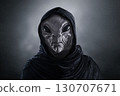 Mysterious humanoid alien at night over dark misty background  130707671