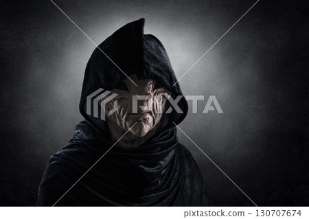 Mysterious humanoid alien at night over dark misty background  Mysterious humanoid alien at night over dark misty background  130707674