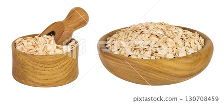 Oat flakes in wooden bowl and scoop isolated on white background with full depth of field 130708459