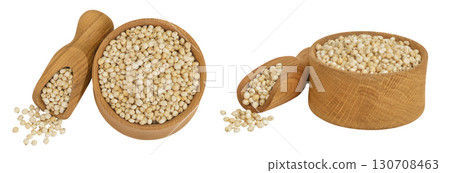 Sorghum seeds in wooden bowl and scoop isolated on white background. Top view. Flat lay. Sorghum seeds in wooden bowl and scoop isolated on white background. Top view. Flat lay. 130708463