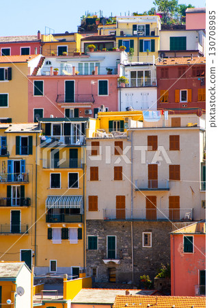 Multicolored houses on cliff edge. Manarola Italian village Cinque Terre, Liguria, Italy city architecture 130708985