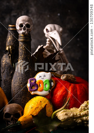 Halloween cookies in shape of ghost, jack-o-lantern and skull 130709348