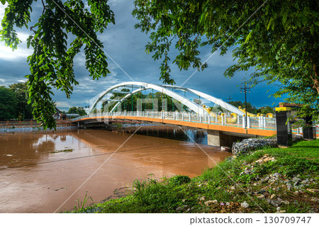 Chan Palace Bridge over the Nan River rises Chan Palace bridge blue sky background New Landmark It is a major tourist is Public places attraction Phitsanulok at daytime 130709747