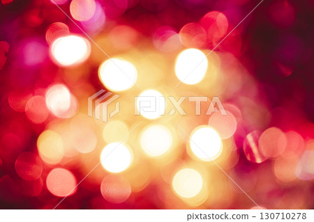 Festive blurred Christmas background, shining pink and yellow lights 130710278