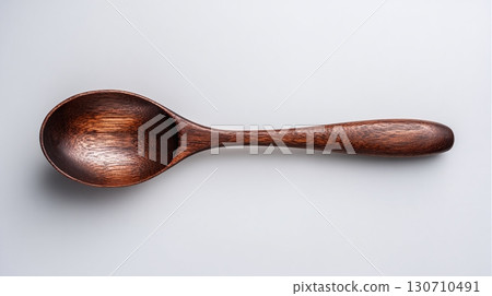 Wooden Spoon: Rustic charm meets practical use. A simple yet elegant kitchen utensil crafted from natural wood, perfect for cooking and serving. 130710491