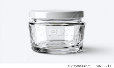 A simple glass jar with a white lid, isolated against a white background, showcasing its clean and modern design for cosmetics or food storage. 130710714