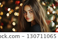 Young caucasian female with long hair posing by festive holiday lights 130711065