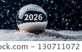2026 snow globe with falling snowflakes on a dark background 130711072