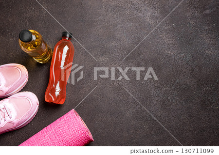 Isotonic sport drink with sneakers and fitness mat 130711099