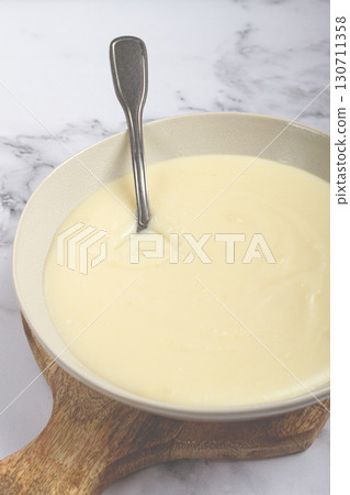 Mashed potatoes, with suluguni cheese, homemade, on a marble table, no people, top view, 130711358